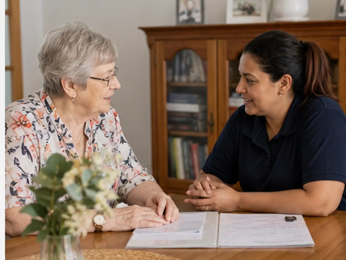 Older resident and cleaner discussing preferred household tasks